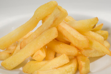 French fries portion on a plate.
