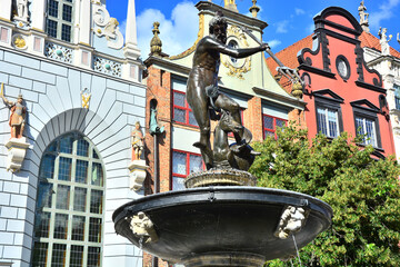 Neptun's fountain in old town of Gdansk, at Dlugi Targ street, Long Market street