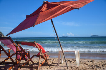 beach chairs and umbrellas