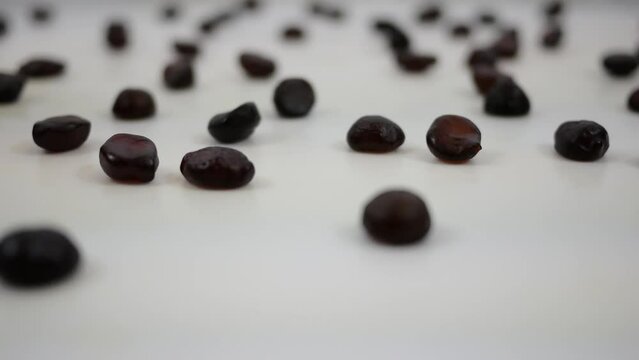 Adult Gummies Spinning Over White Background