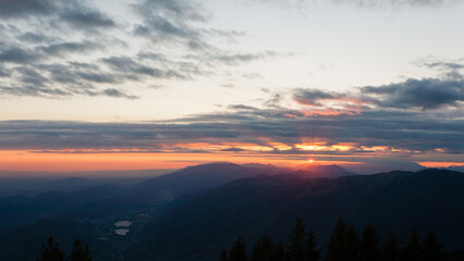 Sunset from Pizzoc mount top. Cansiglio woodland, Italy