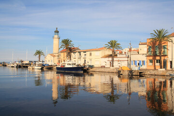 Lighthouse and old fishing port of Grau du roi in Camargue, a resort on the coast of Occitanie region in France
