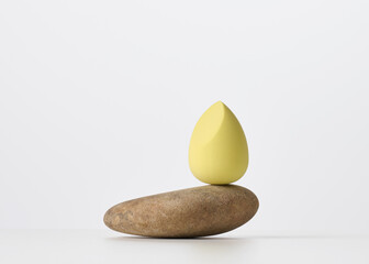 oval sponges for applying makeup on a white background. beauty items