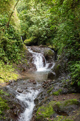 Great and big waterfall in the rainforest of Costa Rica