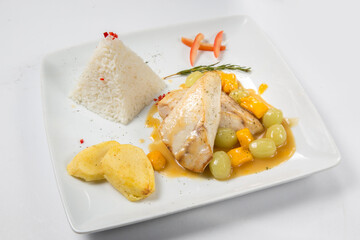 Oriental fish and fruit sauce.