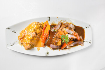 Paruvian food: Tacu tacu with sea food sauce and salted beef.