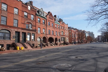 Streetscape of Red Brick Row Buildiings in Urban Setting on Winter Day