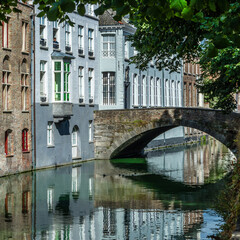 Old buildings along the canal in Bruges, Belgium