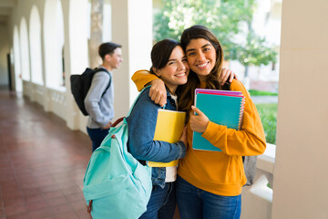 Female university students embracing