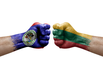 Two hands punch to each others on white background. Country flags painted fists, conflict crisis concept between belize and lithuania