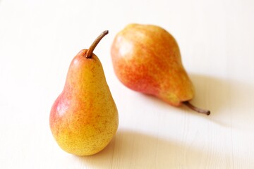 pear yellow with red side, pear variety trout, beautiful juicy pears organic, beautiful fresh fruits, copy space, space for text