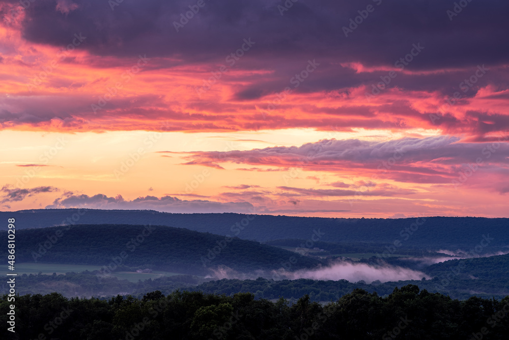 Wall mural sunset in the mountains