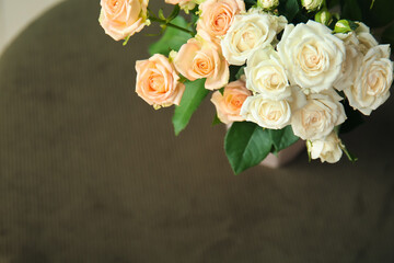 Bouquet of beautiful fresh roses on table, closeup