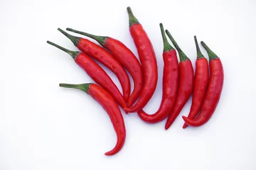 Fotobehang Red hot chili on white background. Concept : Food ingredient. Organic vegetable for cooking. Agriculture crops in Thailand that Thai farmers grow for sale, cook spicy food.           © Sanhanat