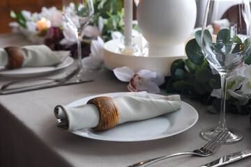 Beautiful table setting with spring flowers