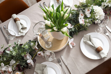 Stylish table setting with tulip flowers
