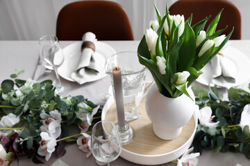Stylish table setting with tulip flowers