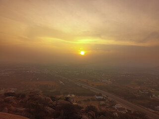 Evening sunset covered by fog on top view in detail 