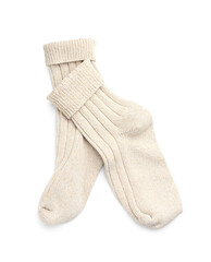 Pair of knitted socks on white background