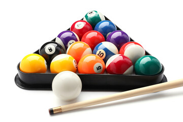 Billiard balls in triangle and cue on white background