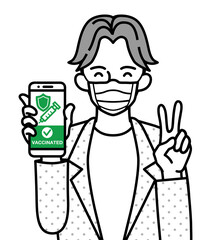 Young man grabs a cell phone which displayed vaccine passport with smile and peace sign