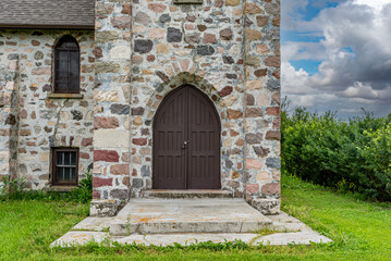 Door to St. Andrews Anglican stone church in Heward, SK