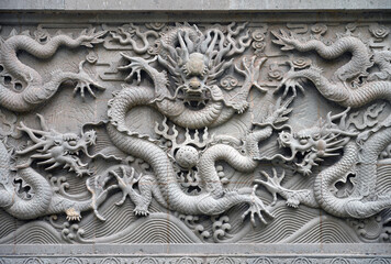 Chinese dragon stone relief fresco