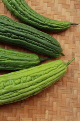 Bitter Melons (Momordica charantia) with woven bamboo on the background