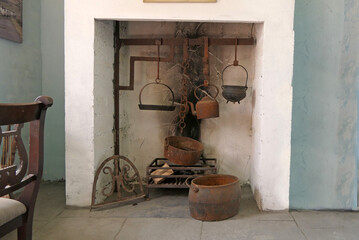 Fototapeta na wymiar An open fire used for burning Turf and Pete for cooking in a old Irish Cottage