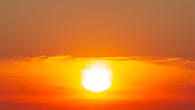 abstract orange cloudy sky and brightness sun, nature background image