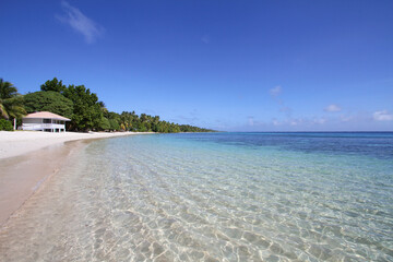 white sand beach and sky in Eneko Island Marshall Islands
