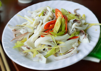 Delicious steamed squid with lemongrass served fresh at a floating restaurant in Binh Hung Island, Vietnam