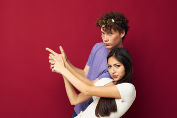 a young couple hand gesture fun friendship isolated background