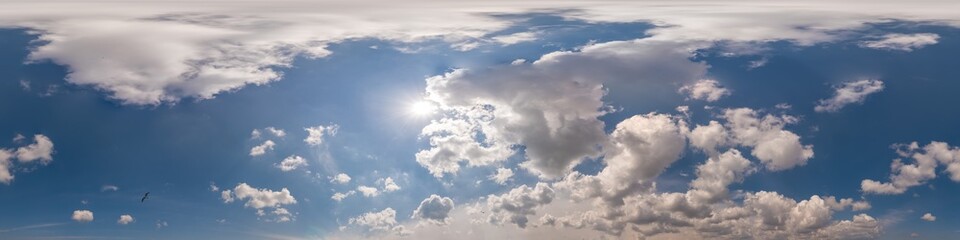 Blue sky panorama with Cirrus clouds in Seamless spherical equirectangular format. Full zenith for use in 3D graphics, game and editing aerial drone 360 degree panoramas for sky replacement.