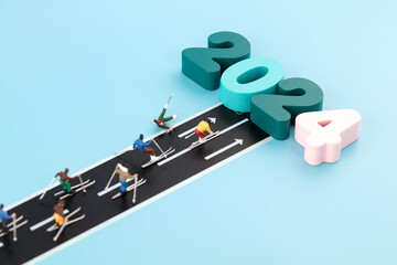 Miniature scene skiing to cross year 2024