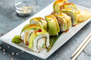 Sushi rolls with avocado and cream cheese, vegetarian sushi roll, ushi menu, restaurant. Seafood, asian food