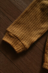 Fototapeta na wymiar Warm knitted baby clothes