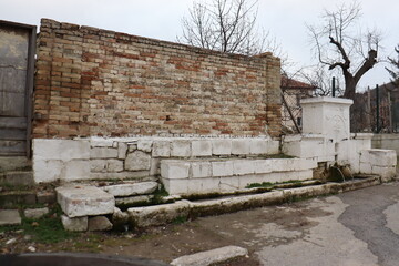 
Fountain with two eyes full of water in the village of Troitsa, Bulgaria
