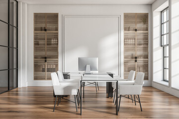 Light office room interior with workplace, chairs and table, shelf near window