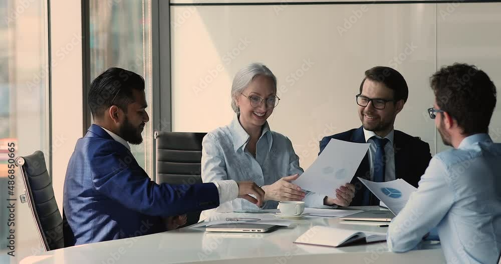 Canvas Prints satisfied older age businesswoman young male investor reached agreement at round table discussion sh