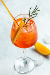 Aperol spritz cocktail. Italian cocktail with bloody oranges, red bitter, dry white wine, soda, zest and ice. freeze motion in jar glass