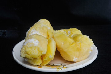  fermented cassava served on a white plate
