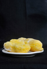 fermented cassava served on a white plate