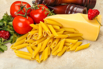 Raw penne rigate for cooking