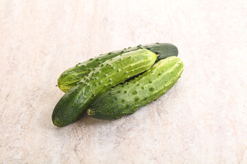 Fersh juicy green cucumbers heap