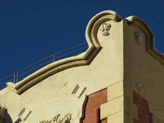 Detail of top curved decoration of a Revival building in the old city center of Zamora. Spain.