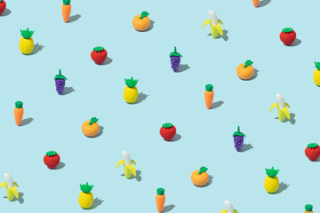 Sunlight Summer pattern made with various fruit on bright light blue background. Minimal summer food concept.