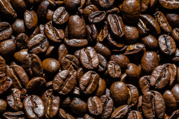 Brown coffee beans background. Coffee beans texture.