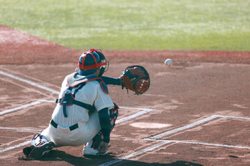 キャッチャーの捕球の瞬間