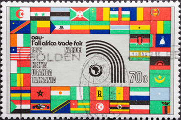 Kenya - circa 1972: a postage stamp from Kenya, showing a Fair Emblem and flags of african countries